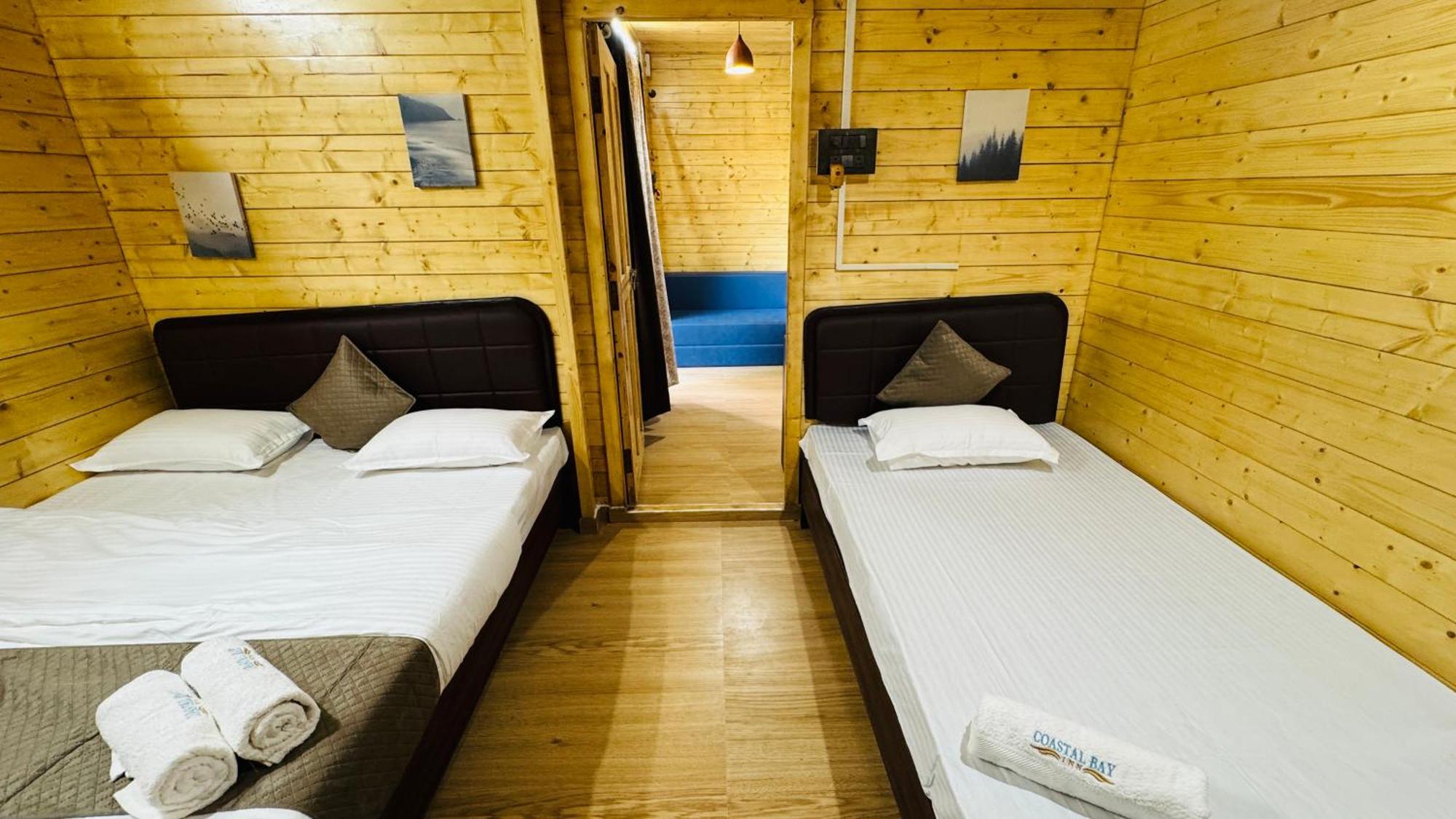 Coastal Bay Inn Алібаґ Екстер'єр фото
